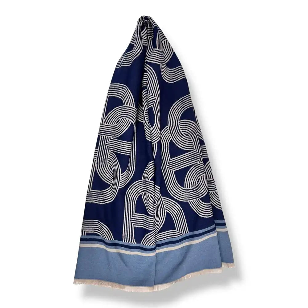 A navy blue scarf with a white geometric interlocking pattern and a light blue border, displayed against a plain white background.