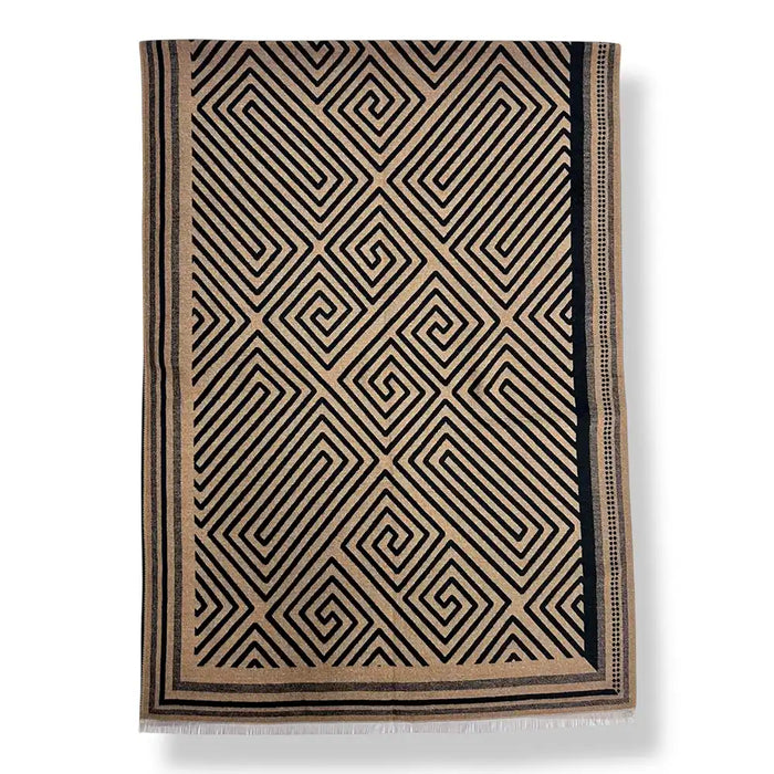 A rectangular scarf with a geometric black and beige Greek key pattern and fringe on the bottom edge, shown against a plain white background.