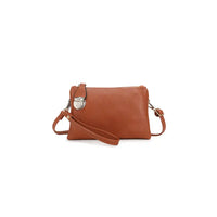 Brown faux leather small  crossbody bag on a white background