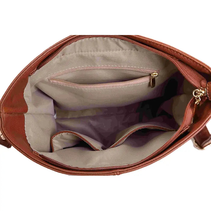 Inside view of handbag showing zipped pocket