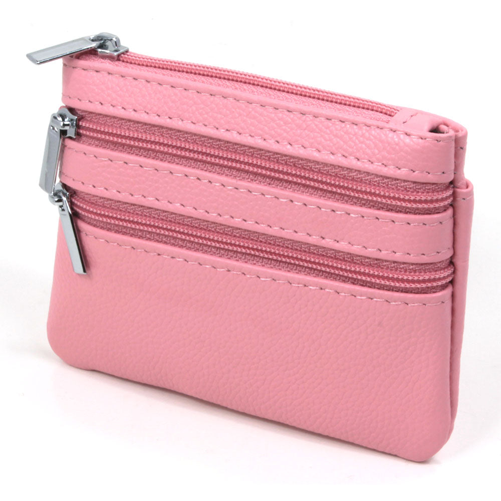 Small pink leather triple zip purse. Zips are pink with silver pullers. Front view showing the zips. 