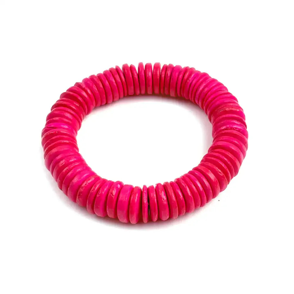Pink coiled bracelet on a white background