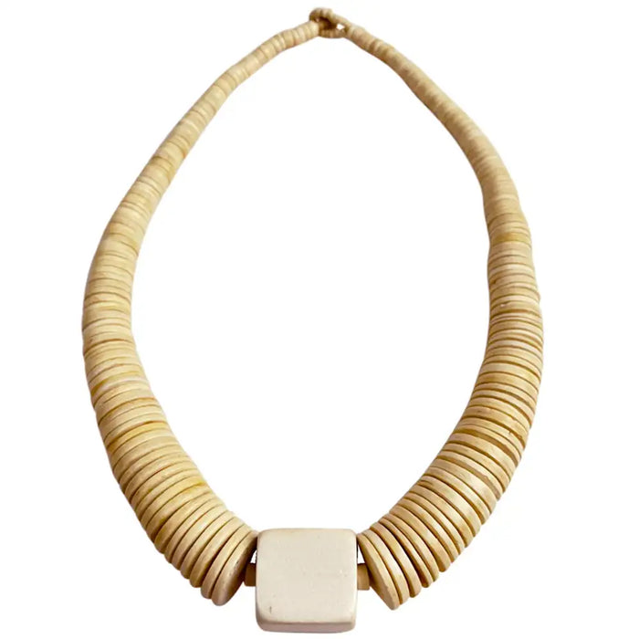 Beige woven necklace with a square pendant on a white background