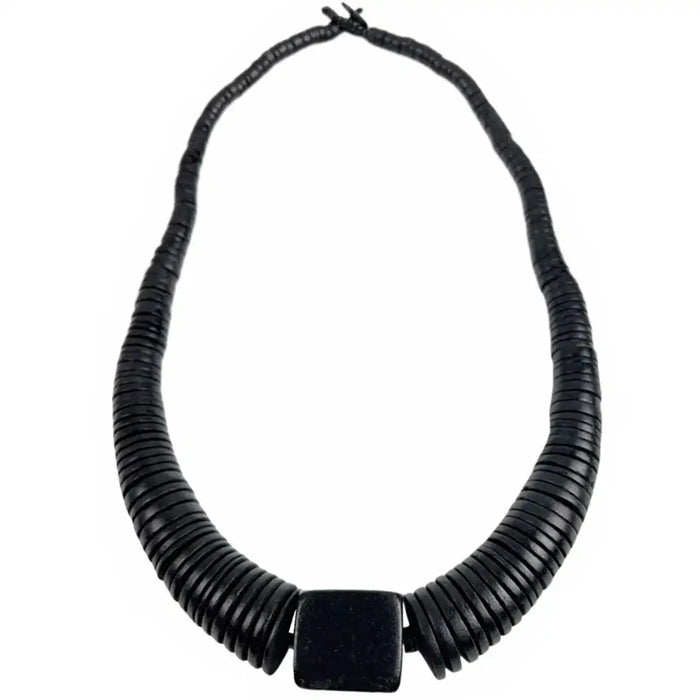 Black ribbed necklace with a square pendant on a white background