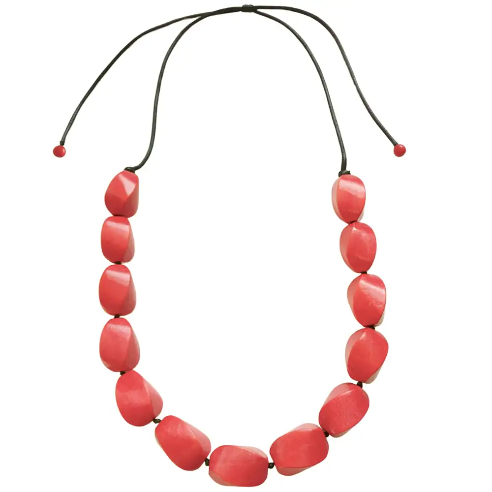 Necklace with red beads on a white background