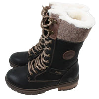 Black winter boots with white fur lining on a white background