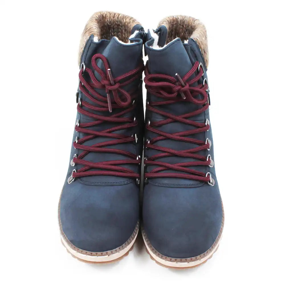 Navy walking boots with knitted cuffs.