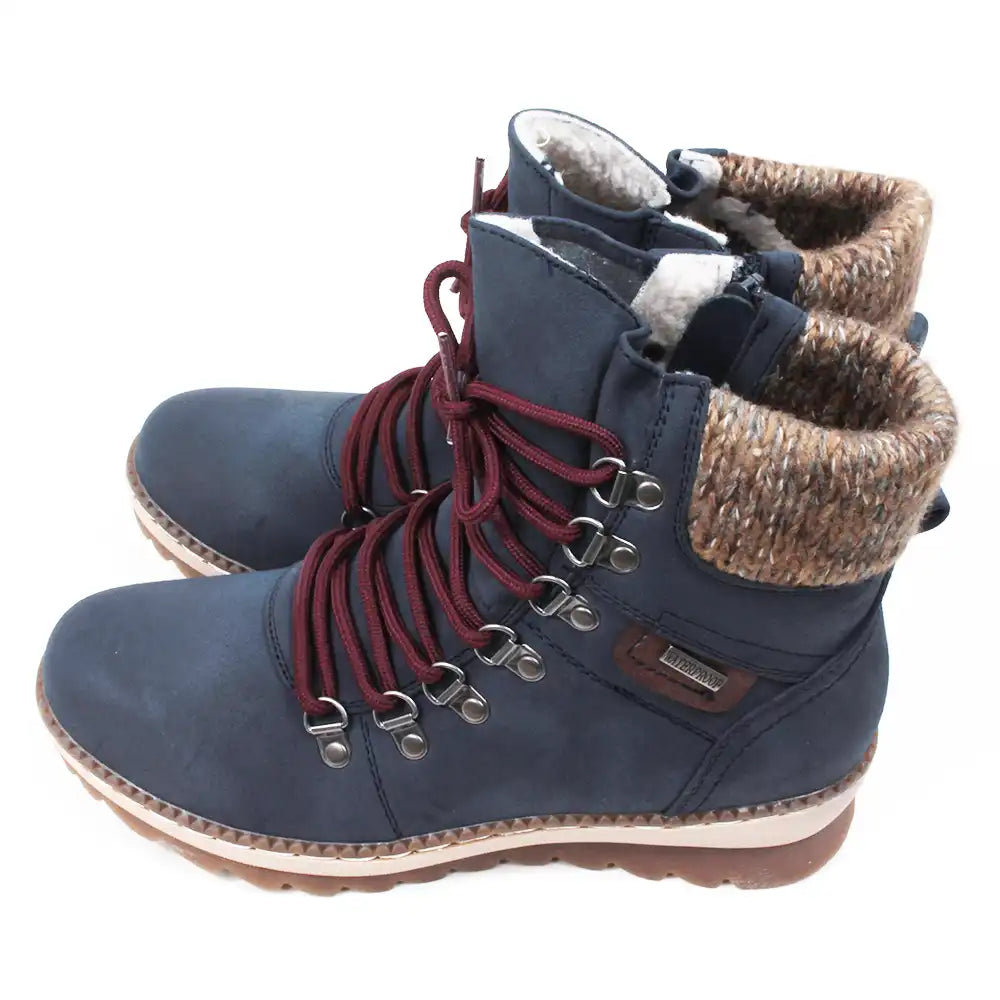 Navy walking boots with knitted cuffs. Side view.