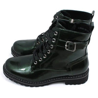 Pair of patent green combat boots with black laces on a white background