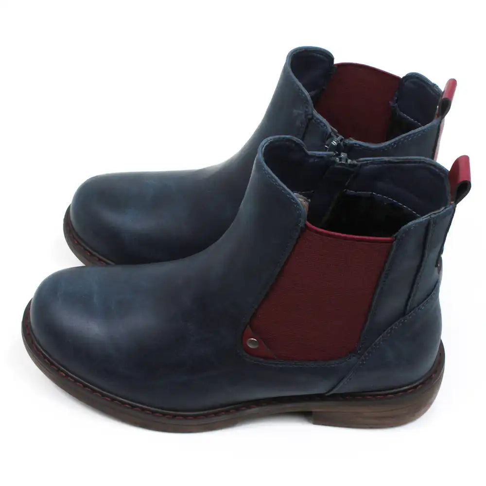 Lunar Suvi Chelsea boots in navy blue. Low heels. Deep red elasticated side panels and ankle tabs. Side view.