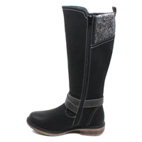 Lunar Vanna tall black boots. Leather feet and suede calves. Grey woollen panel at the back of the legs. Strap and buckles details. View of a single boot showing the zip for fastening.