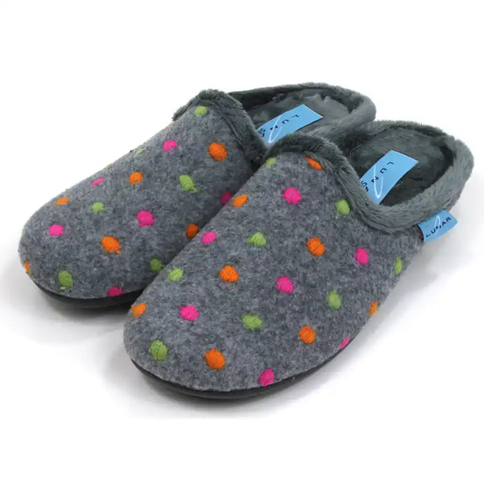 Lunar brand, grey mule slippers with orange, pink and green spots. Grey fur inside. Angled view.