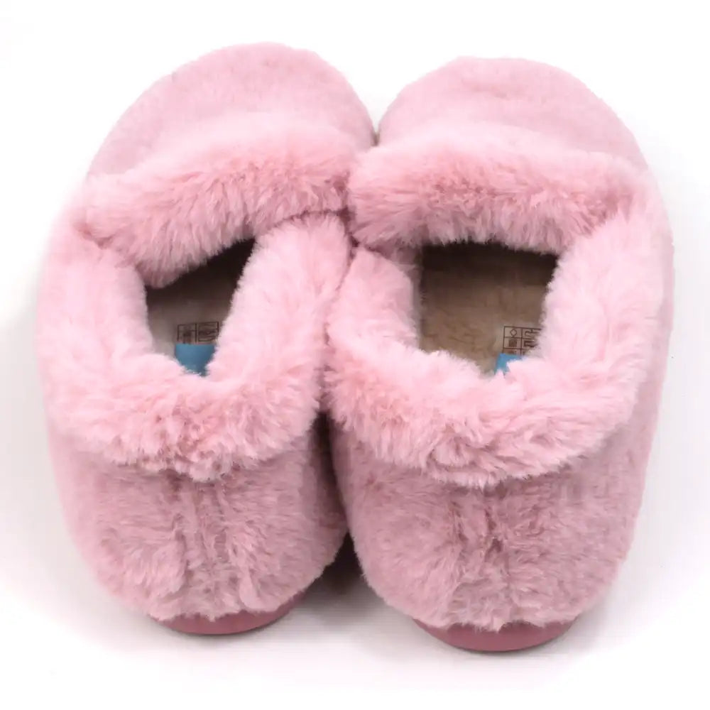 Pair of pink fuzzy slippers on a white background
