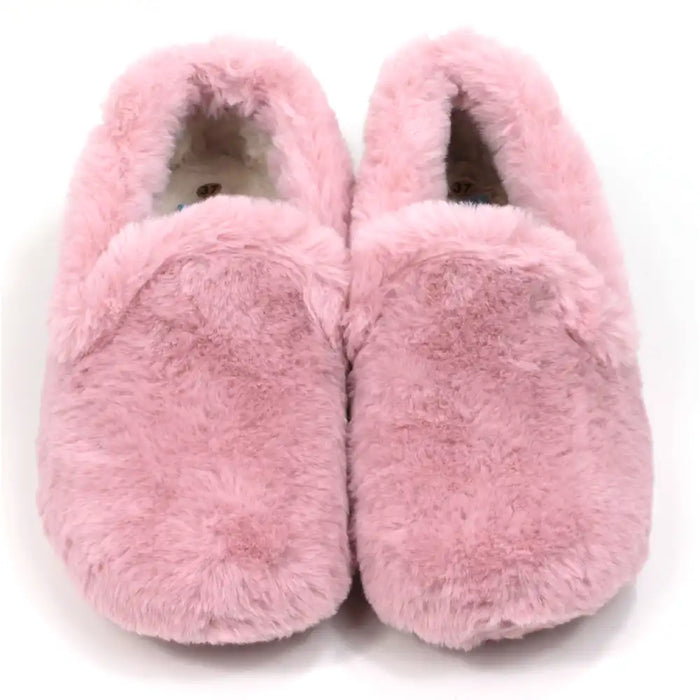 Pair of pink fuzzy slippers on a white background