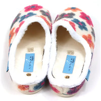 Pair of colorful slippers with floral pattern on a white background