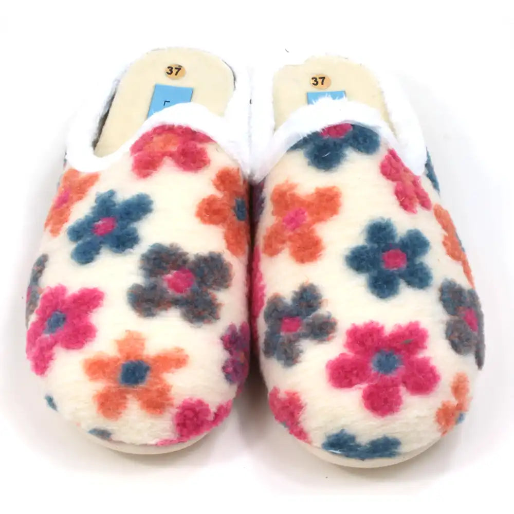 Pair of colorful floral-patterned slippers on a white background