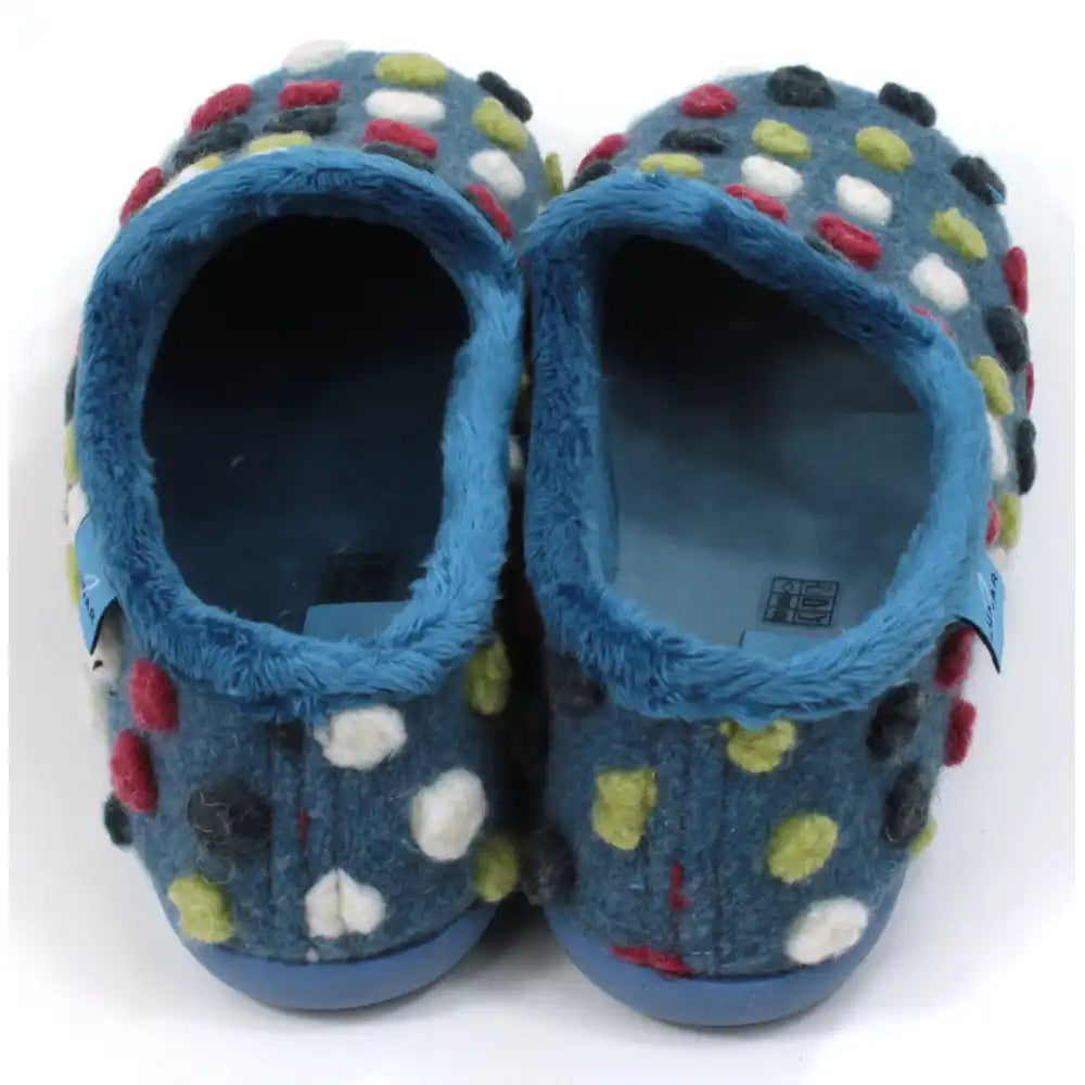 Pair of blue slippers with colorful polka dots on a white background