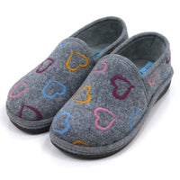 Pair of gray slippers with colorful heart patterns on a white background