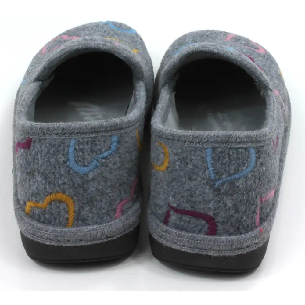 Pair of gray slippers with colorful patterns on a white background