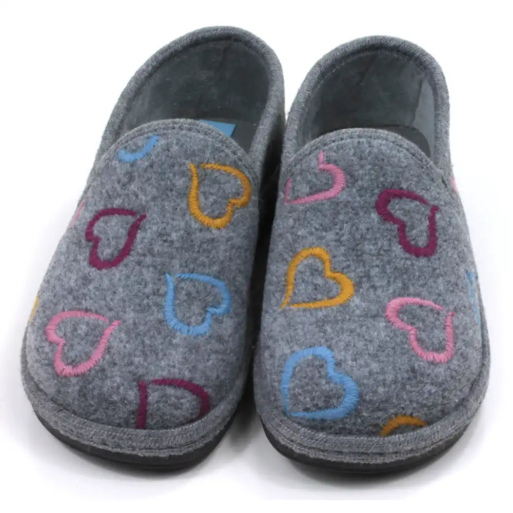 Gray slippers with colorful heart patterns on a white background