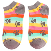 Colorful socks with paw prints and striped pattern on a white background