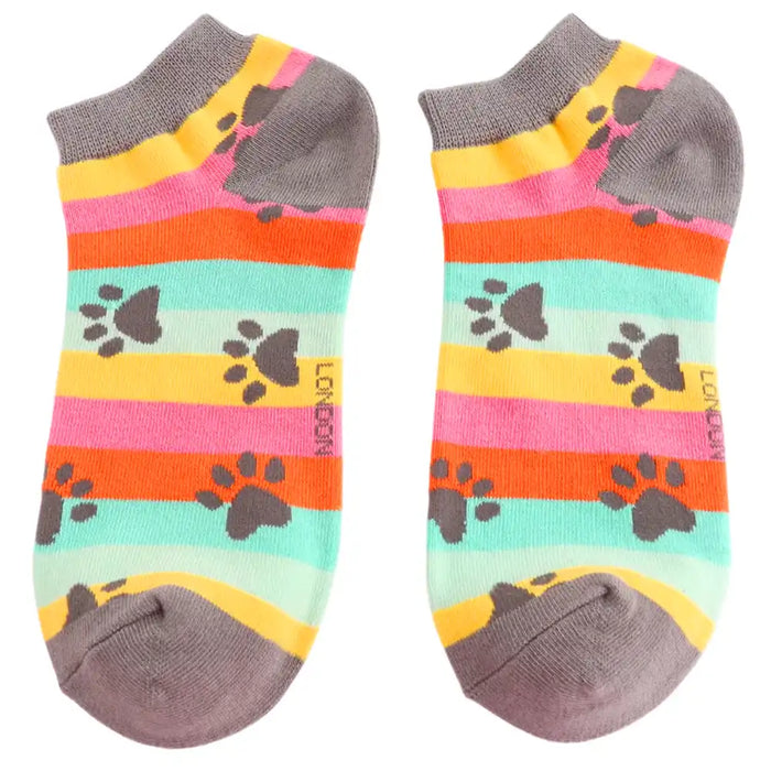 Colorful socks with paw prints and striped pattern on a white background