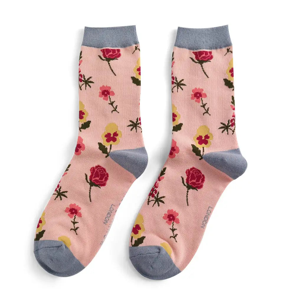 Floral patterned socks with pink background