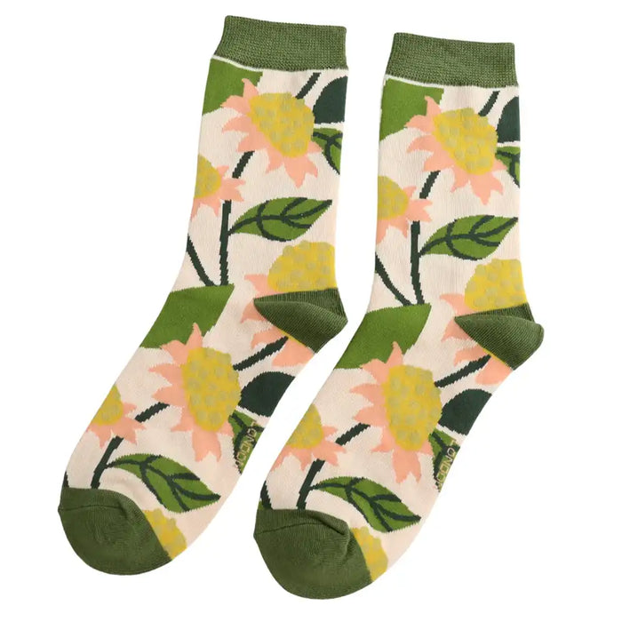 Floral-patterned socks with green accents on a white background