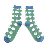 White sheep socks with blue accents on a white background