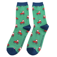 Green socks with red tractor pattern and blue toes, heels and  cuffs on a white background.