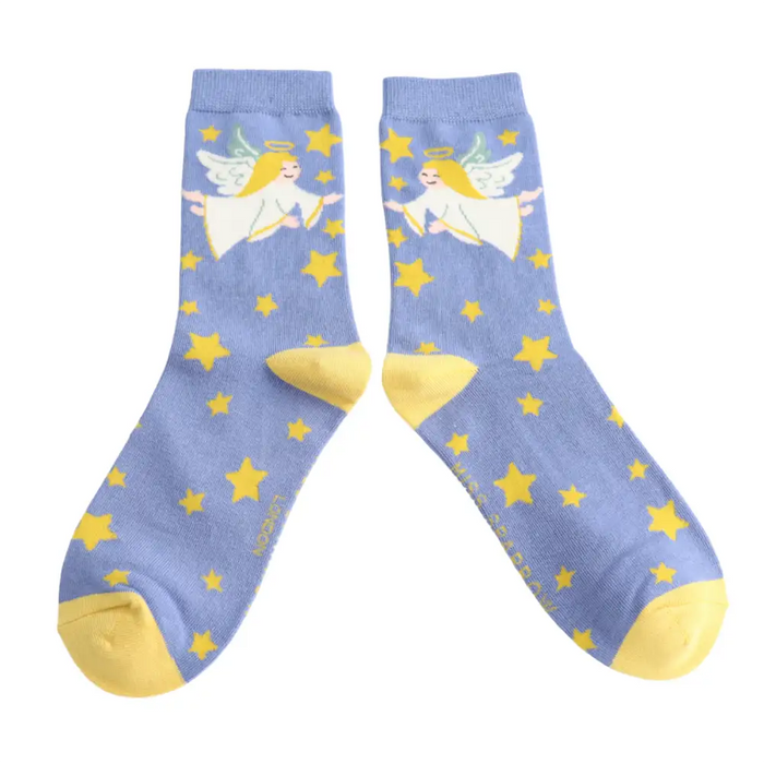 Pair of socks with angel design and yellow stars on a blue background