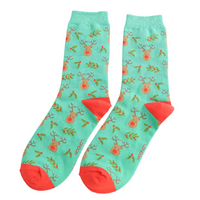 Teal socks with reindeer pattern and red accents on a white background