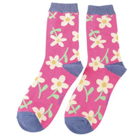 Hot pink socks with a purple coloured cuff, heel and toe. Adorned with white flowers with a yellow centre. 