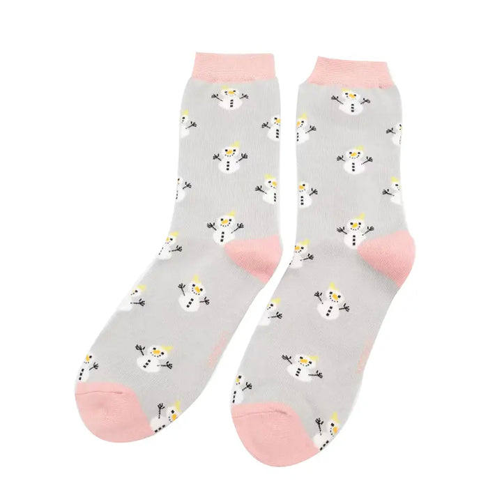Gray socks with snowman pattern and pink toes on a white background