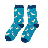 Pair of socks with bluetit bird pattern on a teal blue background