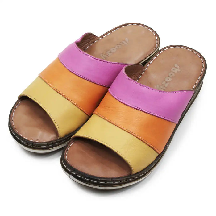 Colorful sandals with a pink, orange, and yellow strap on a white background