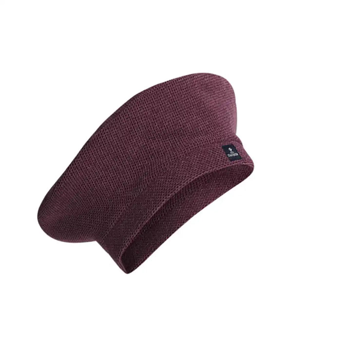 Maroon knit beanie with a brand logo on a white background