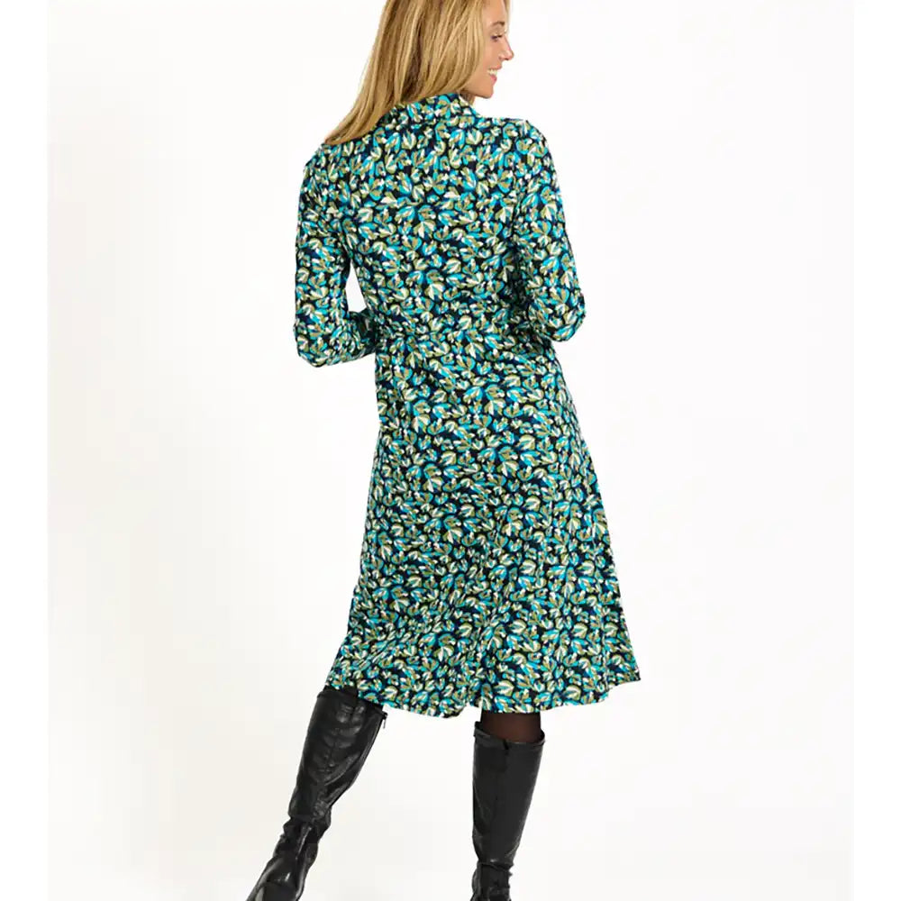 Woman wearing a floral dress with a white background