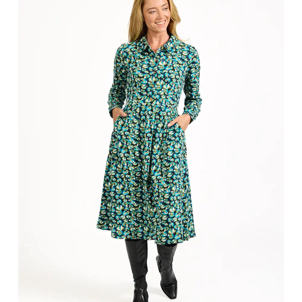 Woman wearing a floral dress on a white background