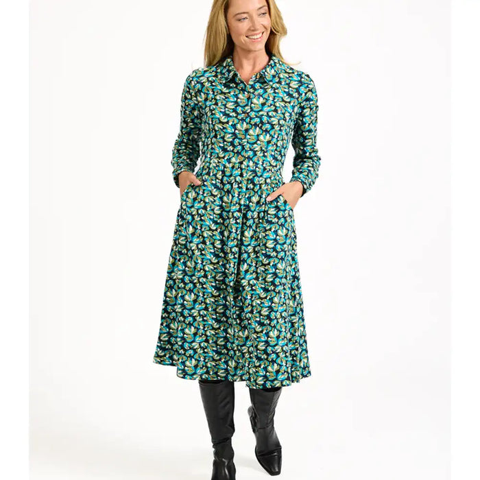 Woman wearing a floral dress on a white background