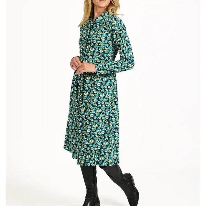 Woman wearing a floral dress on a white background