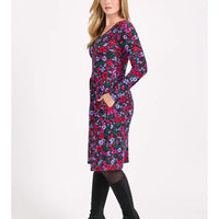 Woman wearing a floral dress on a white background