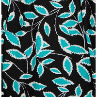 Black fabric with a repeating pattern of turquoise and white leaves and stems.