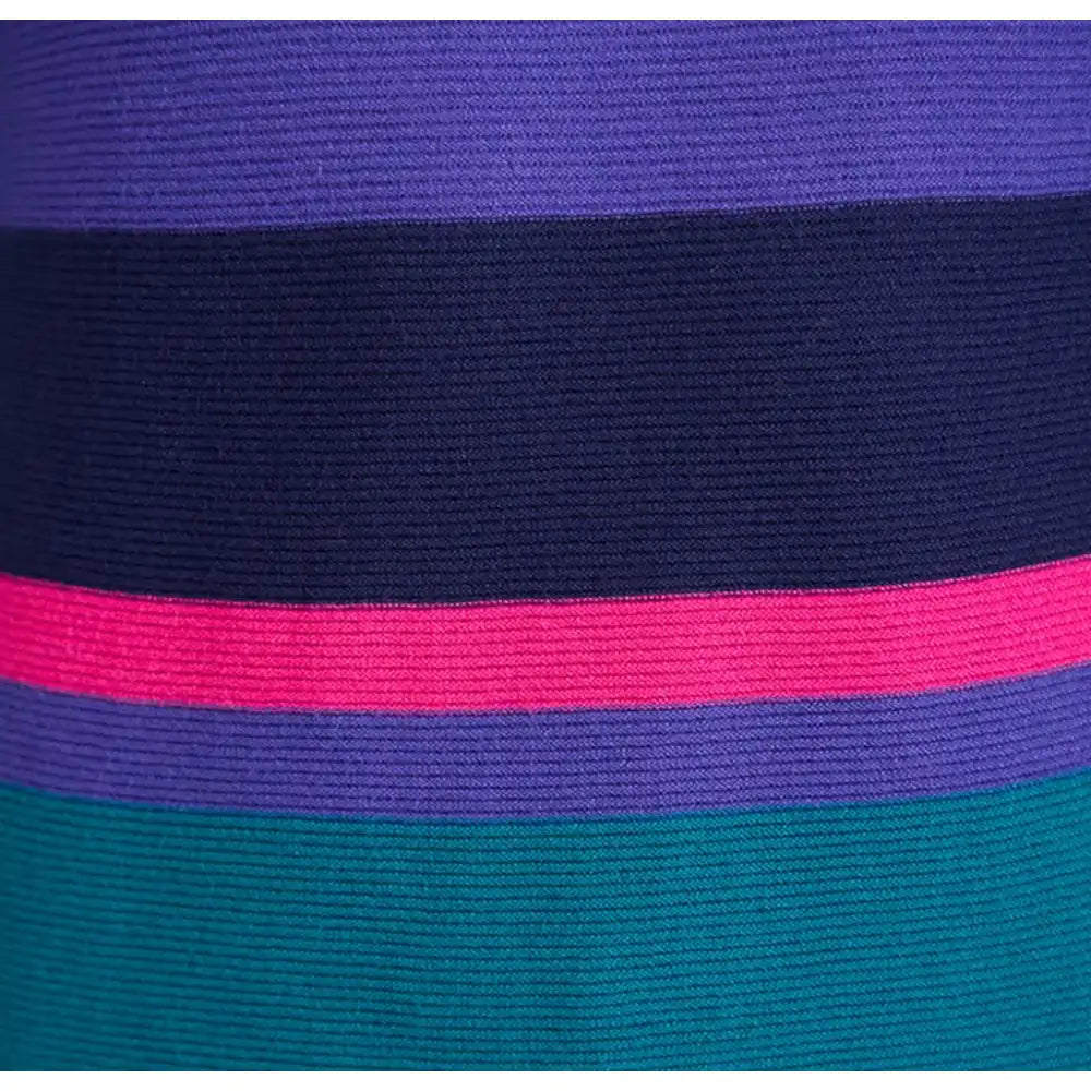 A close-up of a ribbed knit fabric with horizontal stripes in purple, navy blue, bright pink, and teal green.