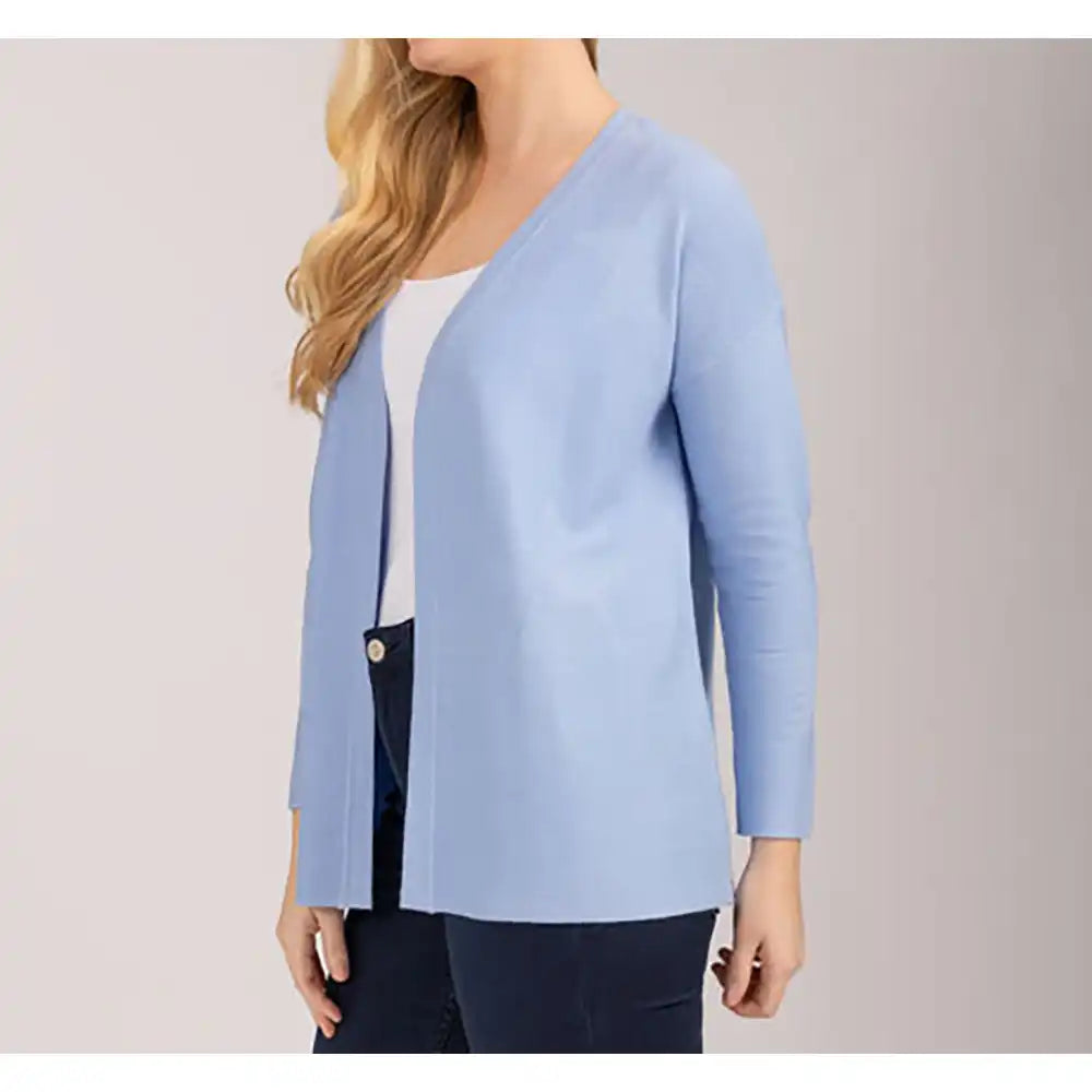 Side of Mudflower conflower blue coloured open edge cardigan. Long sleeves. Star detailing in fabric.