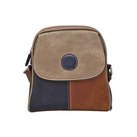 Multicolored bag with a blue circular patch on a white background