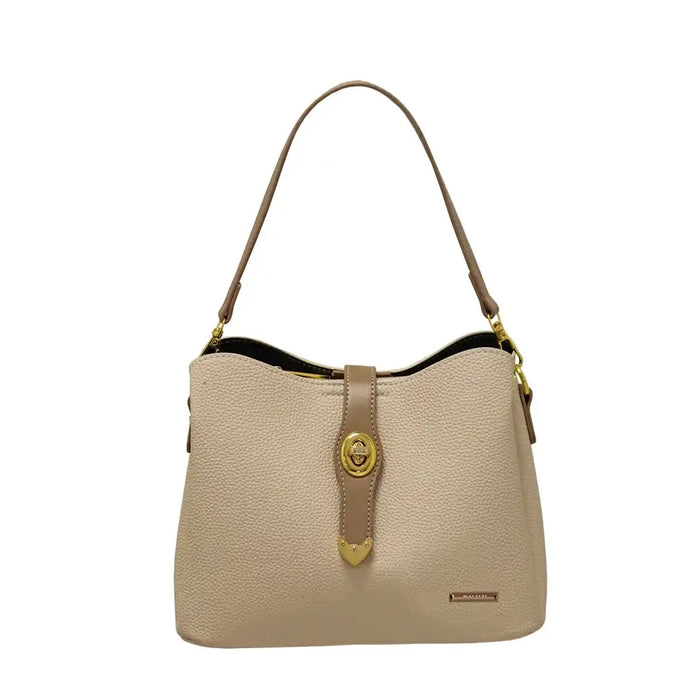 Beige handbag with gold accents on a white background