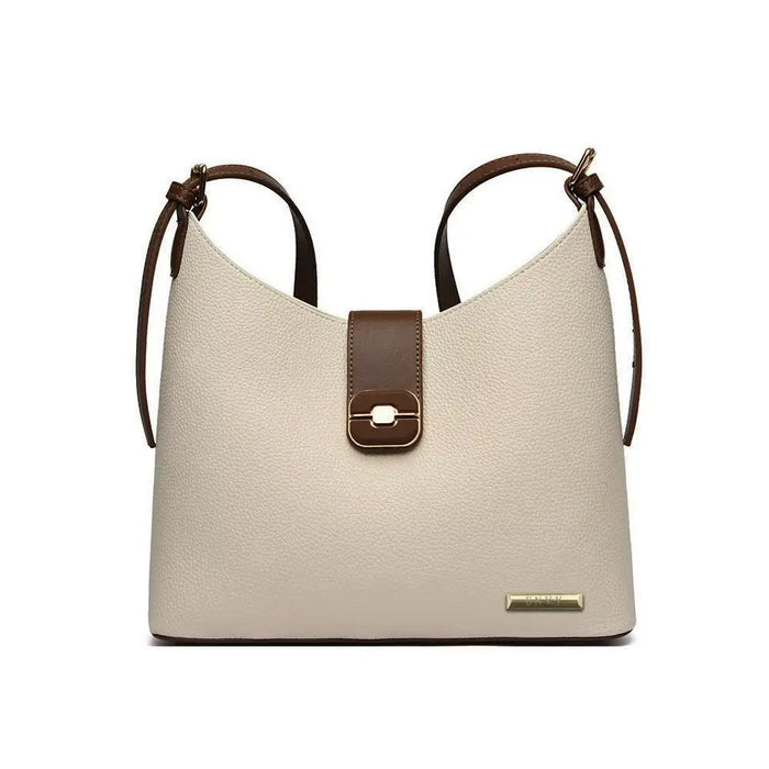 Beige handbag with brown accents on a white background