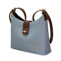 Light blue handbag with brown straps on a white background