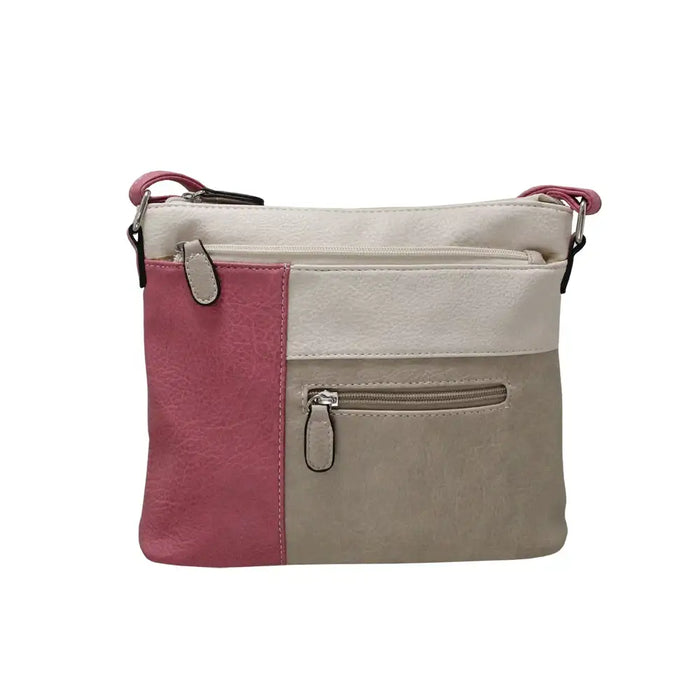 Crossbody bag with pink and beige sections on a white background